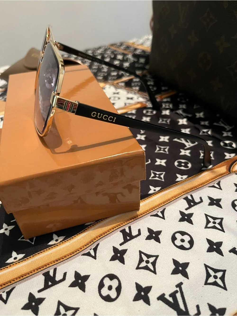 Gucci Gold Frame Sunglasses with Gradient Pink Lenses